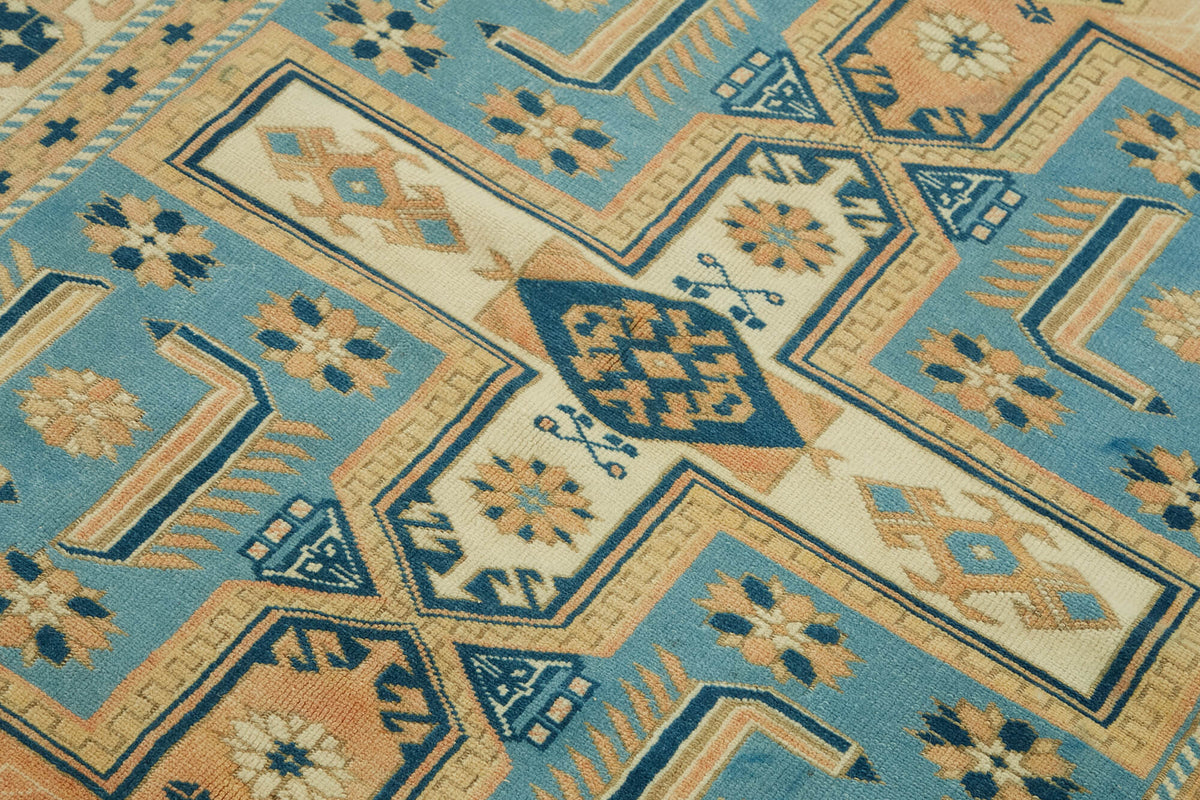 Gekro Mavi Bej Madalyon Desenli Anadolu El Dokuma Halı 123x189 cm – mekânda kullanım