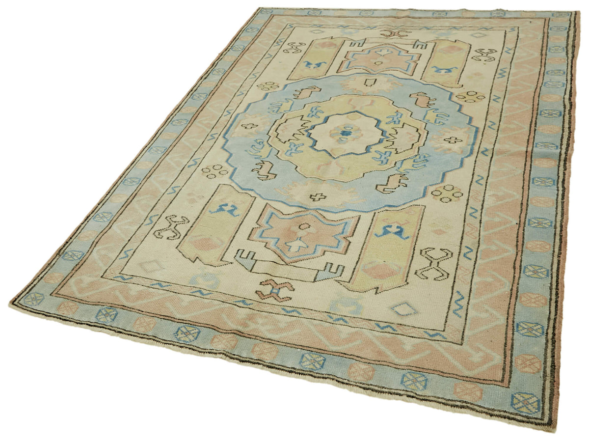 Gekro Etnik Bej Açık Mavi Geometrik Desenli El Dokuma Halı 140x191 cm – doku yakın çekim