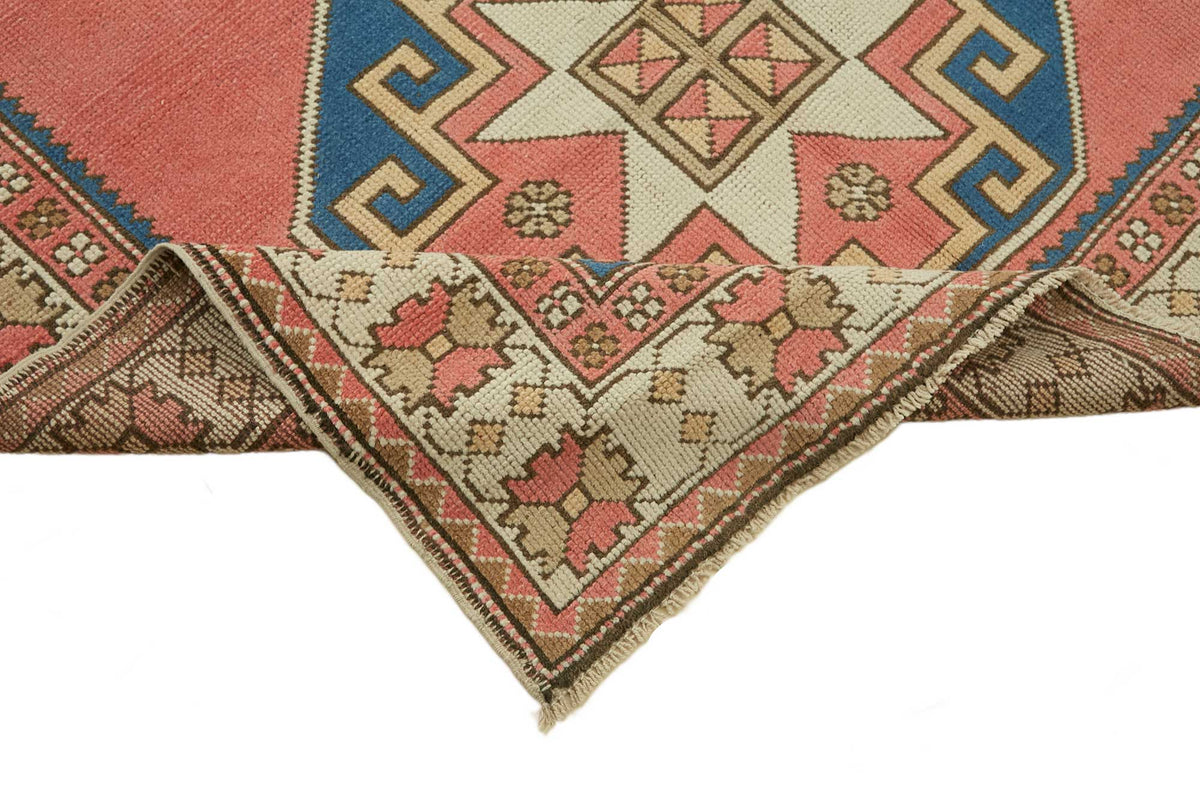 Kavale Kırmızı Lacivert Madalyon Desenli El Dokuma Halı 143x239 cm – kenar detayı