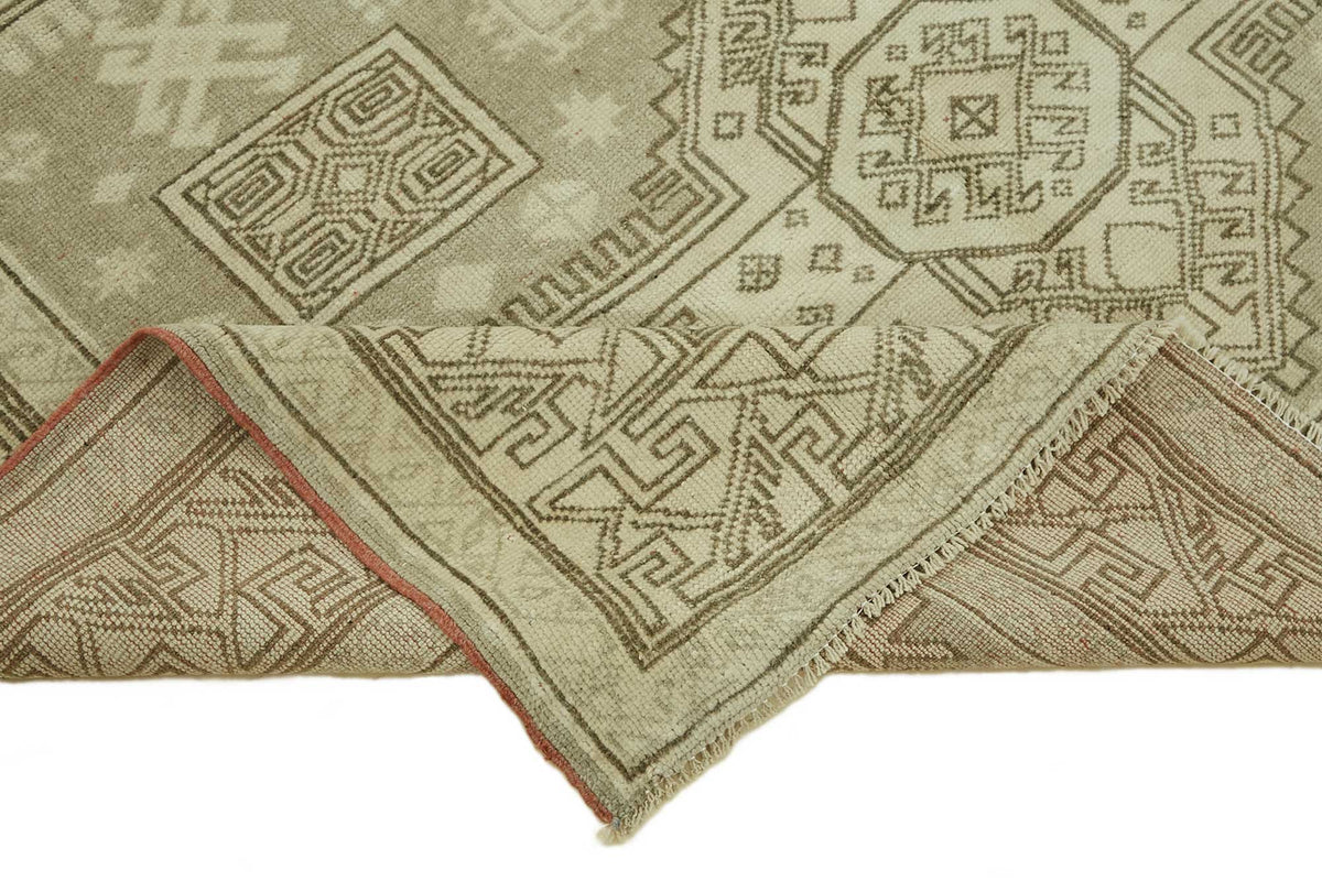 Kavale Bej Rengi Geometrik Desenli El Dokuma Halı 158x212 cm – kenar detayı
