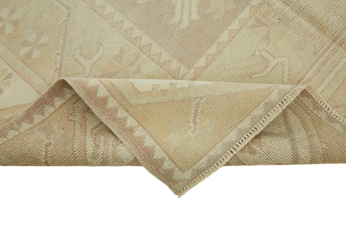 Kavale Geometrik Desenli Vintage Bej Rengi El Dokuma Halı 153x216 cm – kenar detayı