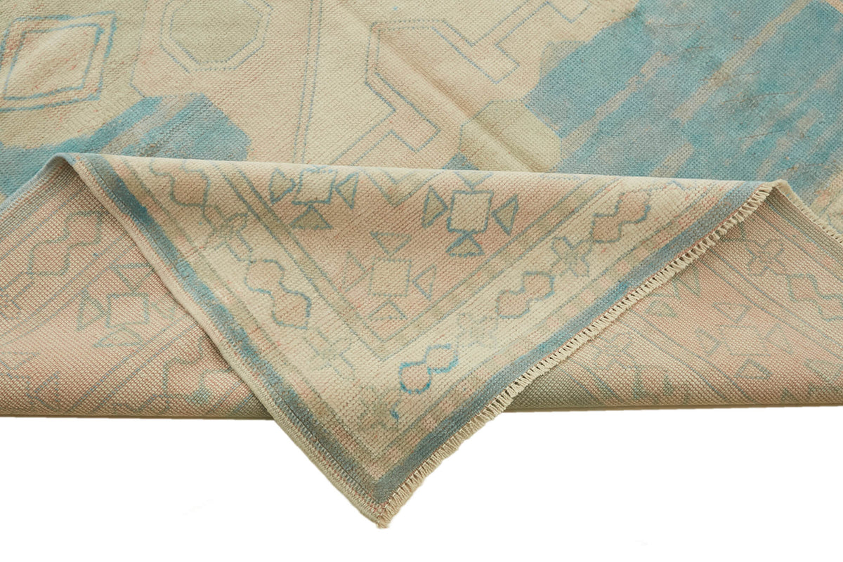 Kavale Dokuma Modern Halı Turkuaz ve Bej Geometrik Desenli 173x237 cm – kenar detayı