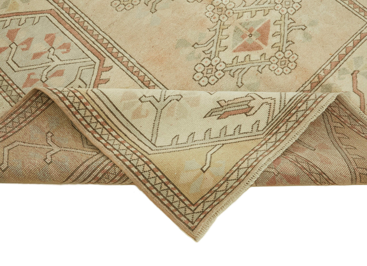 Kavale Madalyon Desenli Açık Pembe ve Bej El Dokuma Halı 191x289 cm – kenar detayı