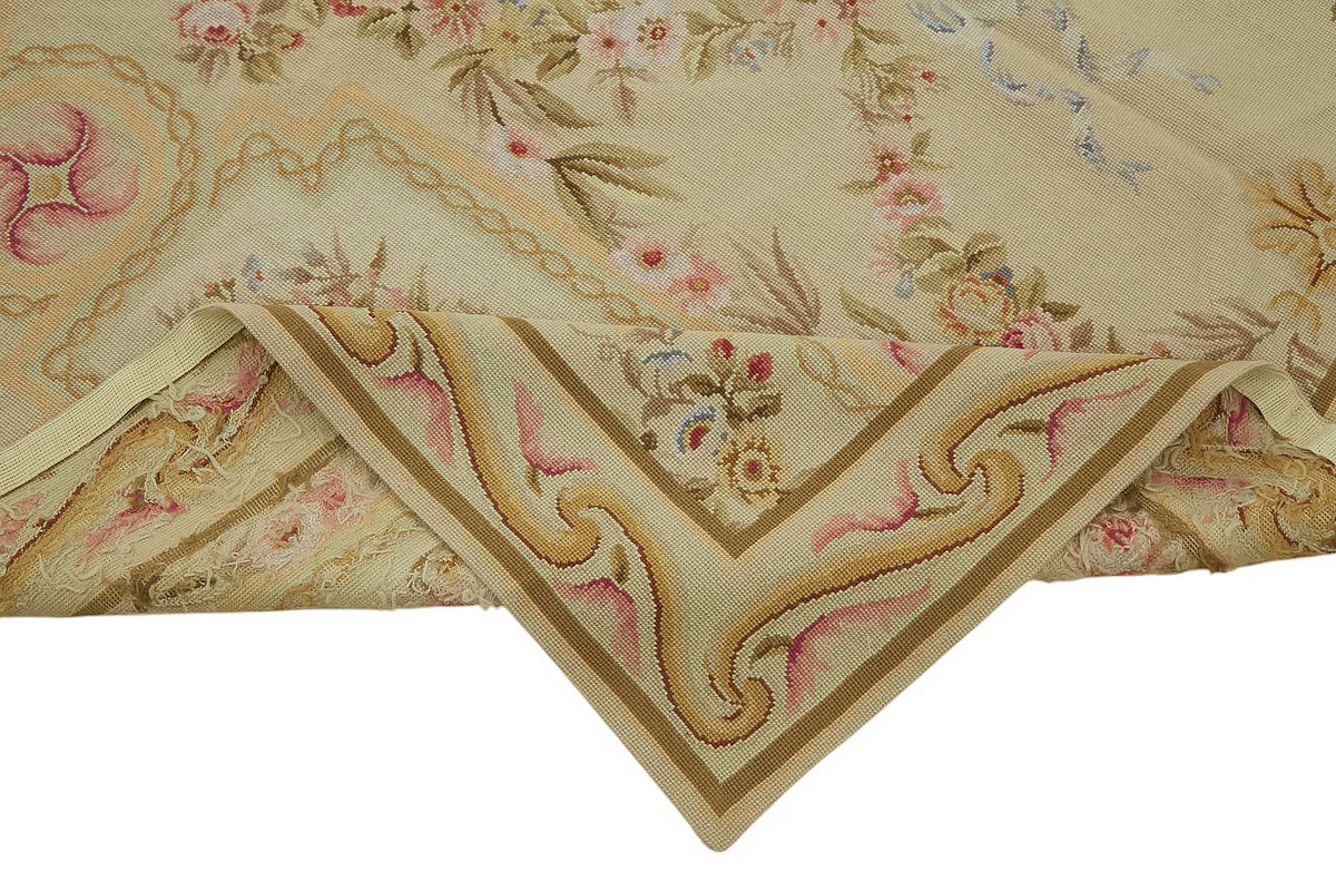 Mevri Çiçek Desenli Bej ve Pembe Needlepoint Halı 177x277 cm – kenar detayı