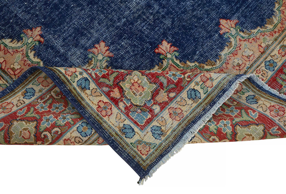 Rusvo Lacivert Kırmızı Madalyon Desenli Yün El Dokuma Halı 244x328 cm – kenar detayı