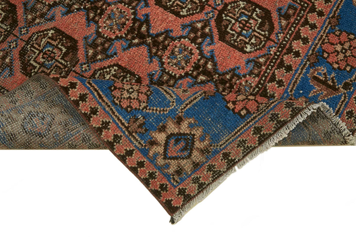 Rusvo Turuncu Mavi Madalyonlu Vintage Yün Halı 105x327 cm – kenar detayı