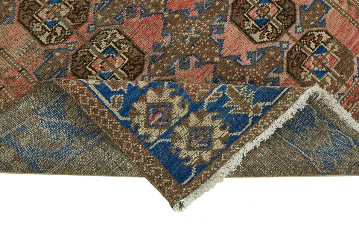 Rusvo Vintage Turuncu Geometrik Desenli El Dokuma Halı 118x252 cm – kenar detayı