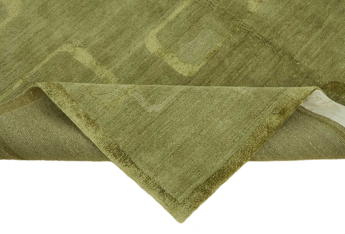 Komve Modern Uşak Halı Yeşil ve Bej Geometrik Desenli 183x273 cm – kenar detayı