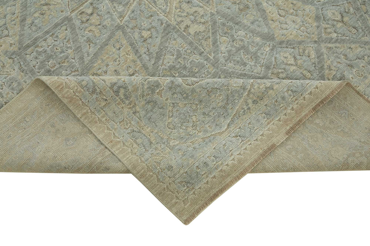 Veltos Uşak El Dokuma Bej Mavi Madalyon Desenli Halı 253x334 cm – kenar detayı