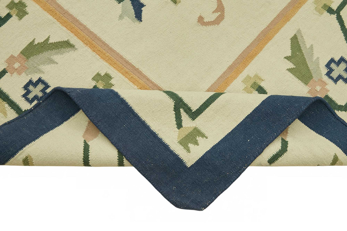 Krovix Çiçek Desenli Modern Kilim Krem ve Lacivert Tonlarda 302x412 cm – kenar detayı