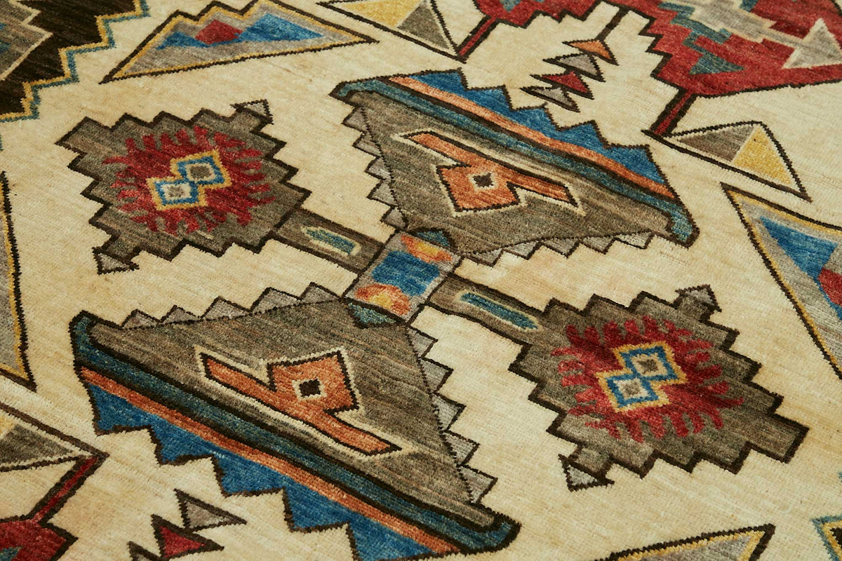 Lomli Krem Geometrik Desenli Yün El Dokuma Halı 150x201 cm – mekânda kullanım