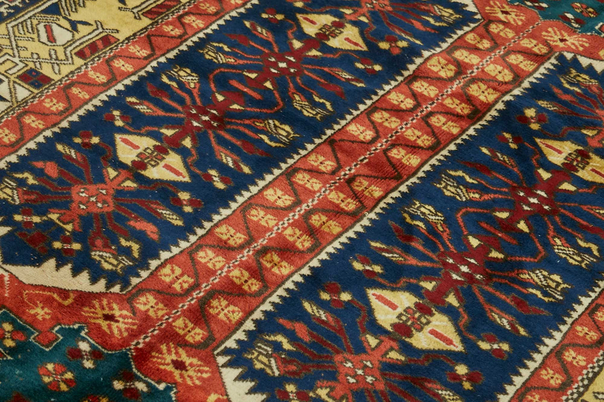 Vamave Lacivert Kırmızı Geometrik Desenli Uşak El Dokuma Halı 170x229 cm – mekânda kullanım