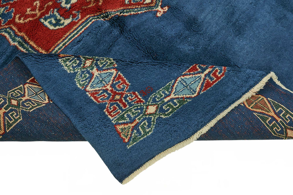 Vamave Lacivert Kırmızı Madalyon Göbek Uşak El Dokuma Halı 188x236 cm – kenar detayı