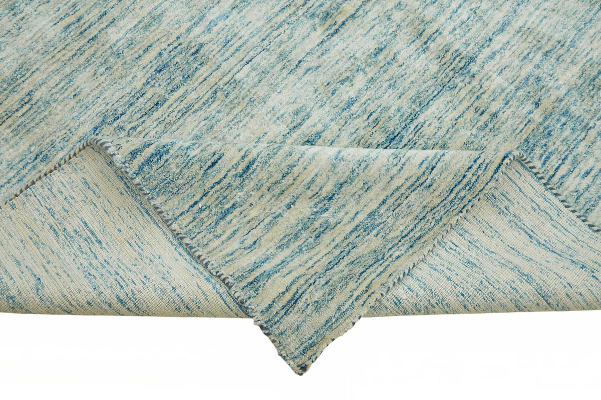 Vamave Soyut Desenli Mavi ve Bej Uşak Halısı 332x443 cm – kenar detayı