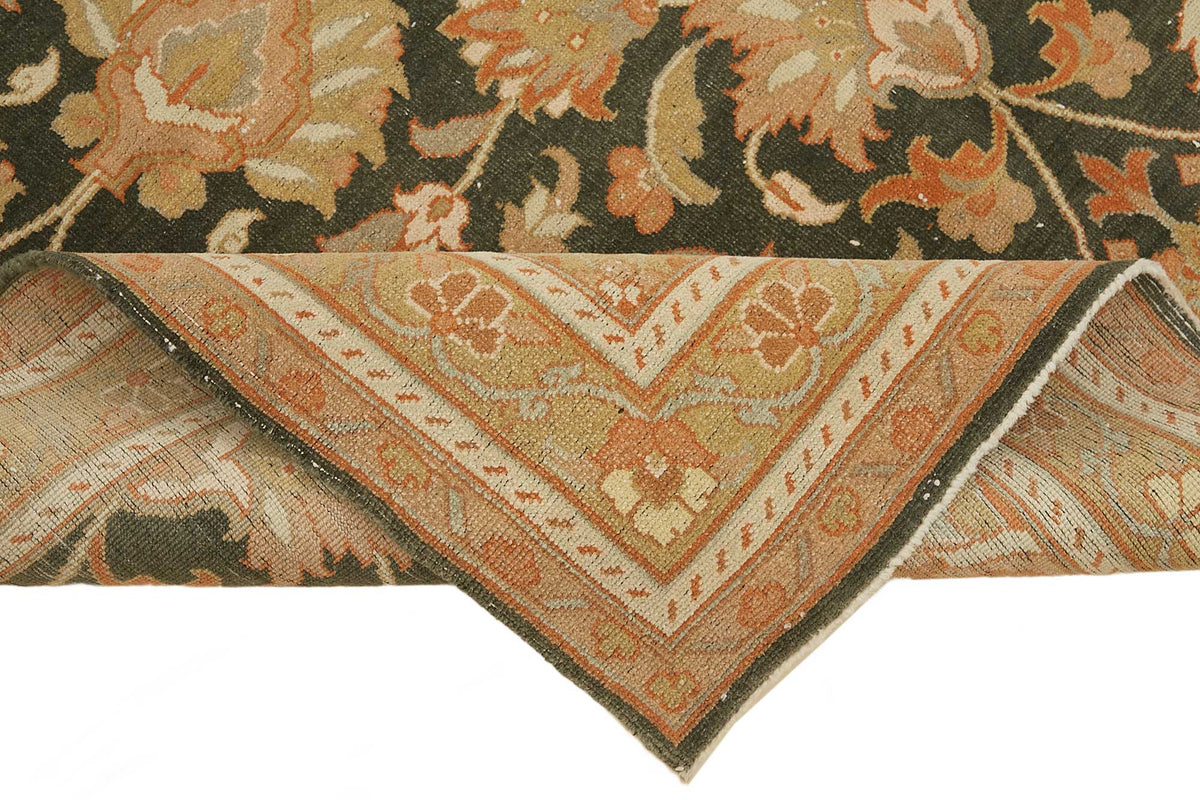 Rusvo Çiçek Desenli Siyah ve Bej El Dokuma Halı 185x185 cm – kenar detayı