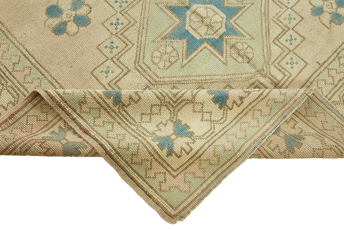 Kavale Etnik Geometrik Desenli Bej Mavi Vintage El Dokuma Halı 176x266 cm – kenar detayı
