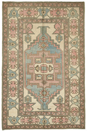 Kavale Bej ve Pembe Geometrik Desenli Yün El Dokuma Halı 179x270 cm