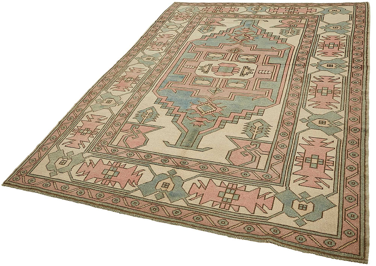 Kavale Bej ve Pembe Geometrik Desenli Yün El Dokuma Halı 179x270 cm – doku yakın çekim