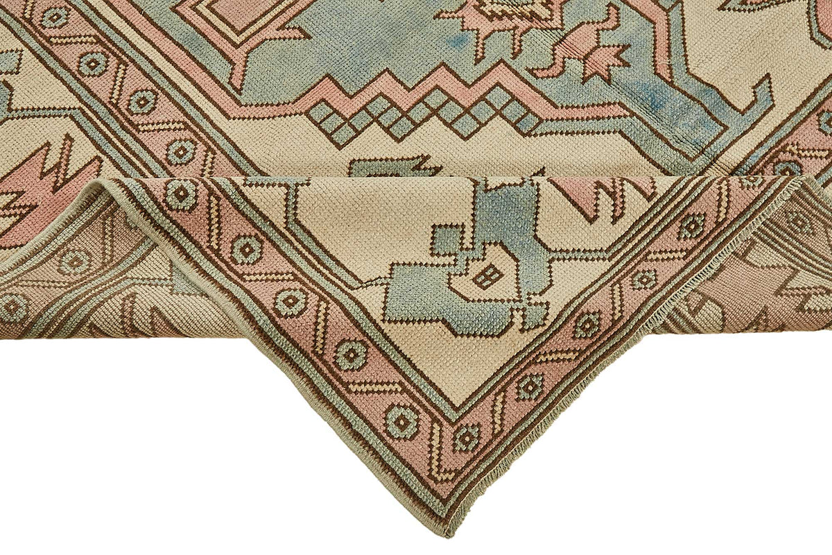 Kavale Bej ve Pembe Geometrik Desenli Yün El Dokuma Halı 179x270 cm – kenar detayı