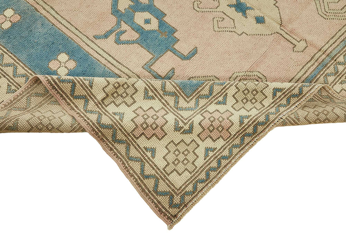Kavale Toz Pembe Madalyon Desenli Yün Halı 184x255 cm – kenar detayı
