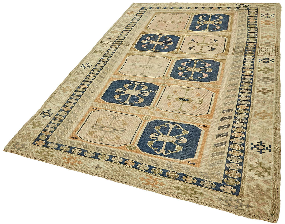 Kavale Bej Lacivert Madalyon Desenli Yün El Dokuma Halı 167x250 cm – doku yakın çekim