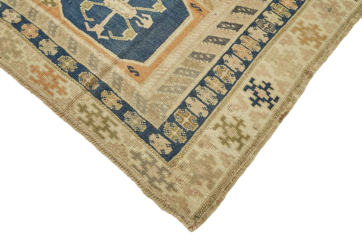 Kavale Bej Lacivert Madalyon Desenli Yün El Dokuma Halı 167x250 cm – detay görünümü