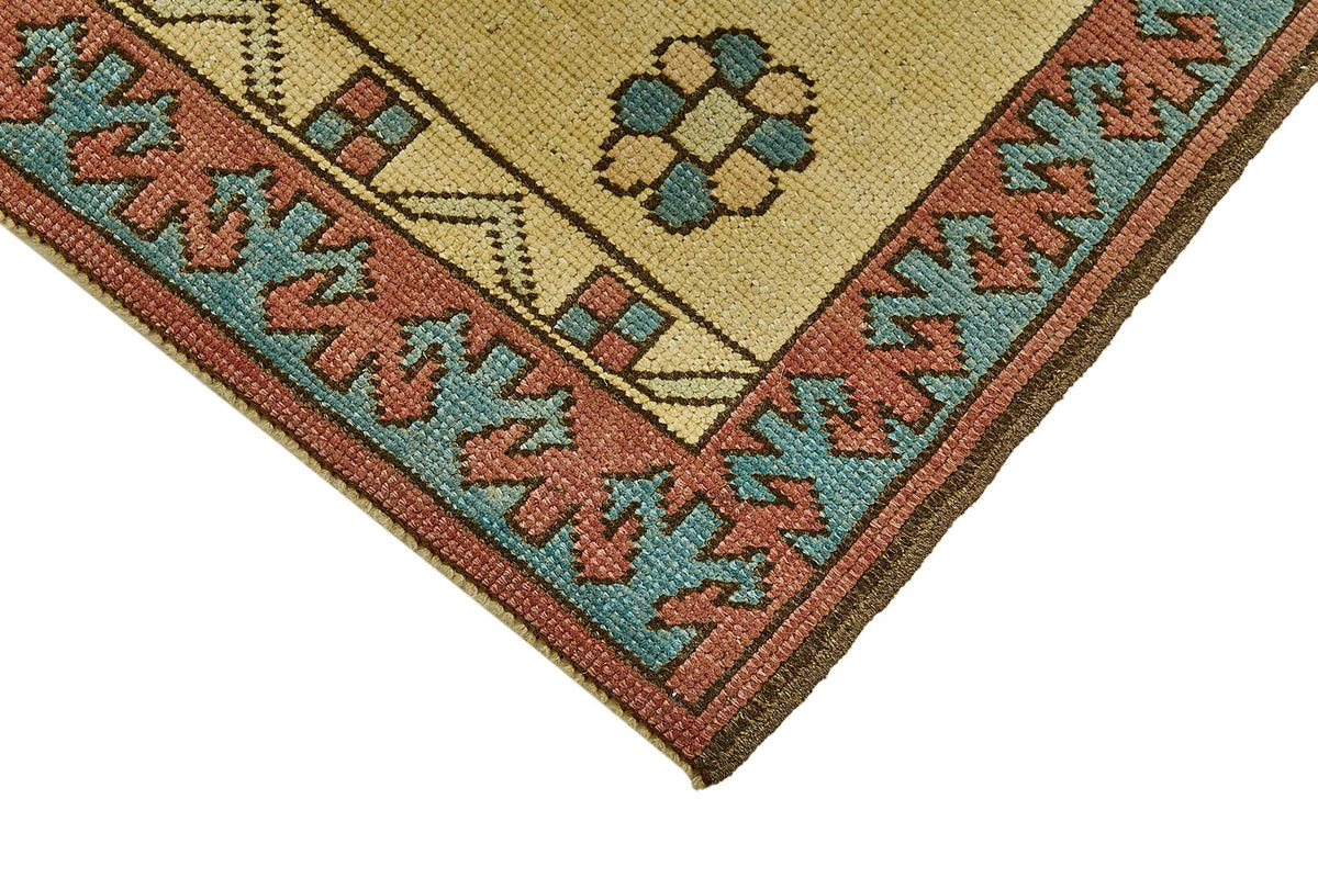 Gekro Sarı Kırmızı Madalyon Göbek Geometrik El Dokuma Halı 84x115 cm – detay görünümü