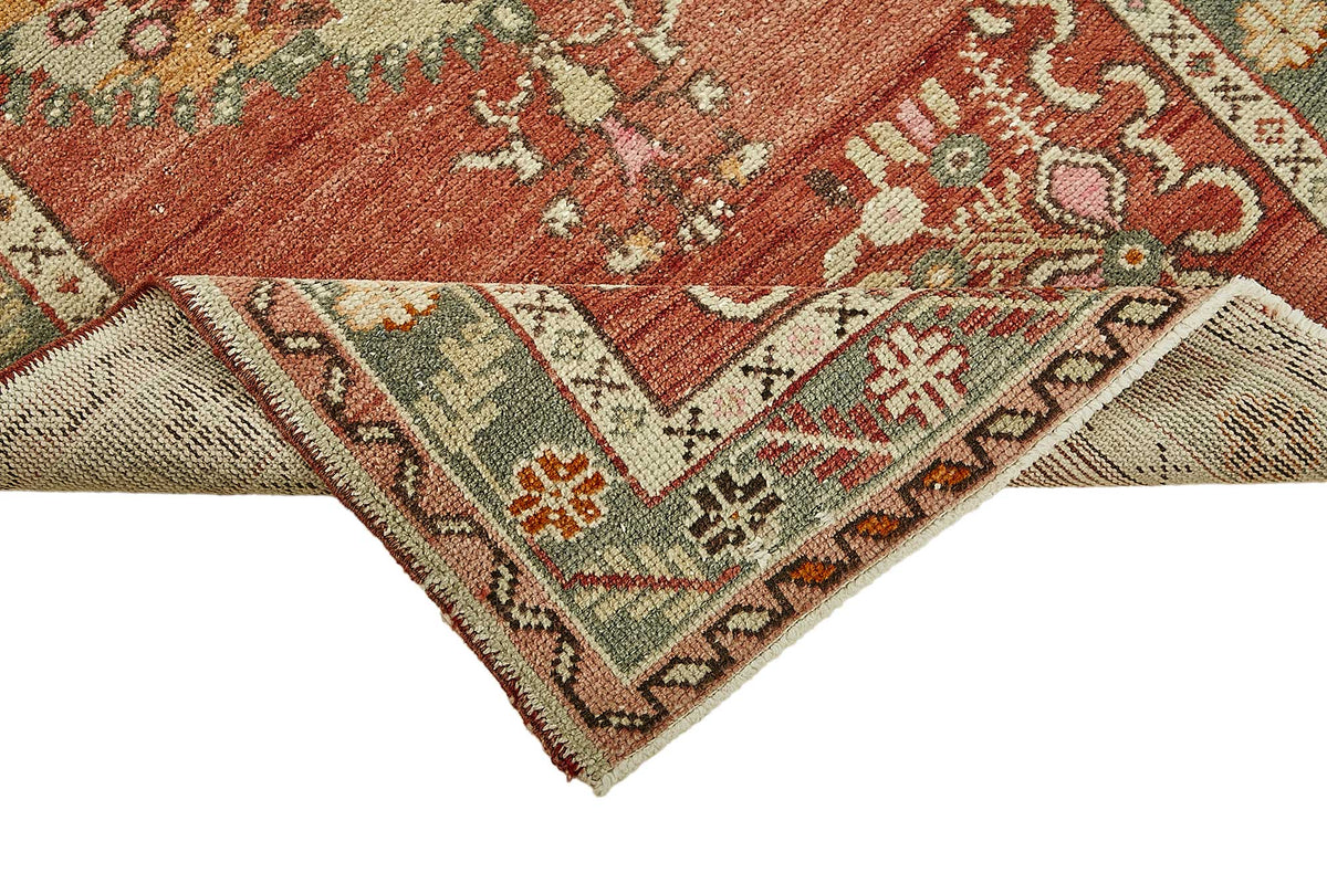 Gekro Kırmızı Madalyon Desenli Yün ve Pamuk Etnik Halı 85x161 cm – kenar detayı