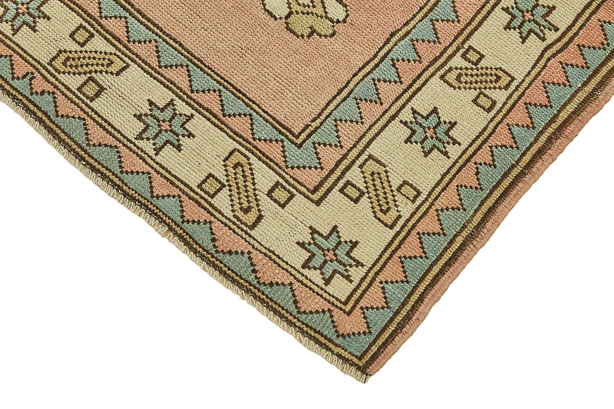 Gekro Pembe ve Mavi Geometrik Desenli Yün El Dokuma Halı 121x191 cm – detay görünümü