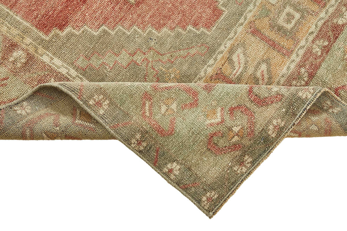 Gekro Yeşil ve Kırmızı Geometrik Desenli Yün Etnik Halı 106x193 cm – kenar detayı
