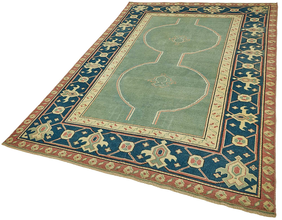 Kavale Madalyon Desenli Turkuaz ve Lacivert El Dokuma Halı 151x242 cm – doku yakın çekim