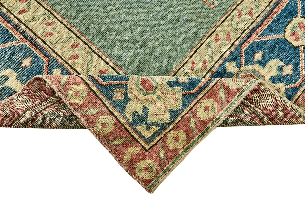 Kavale Madalyon Desenli Turkuaz ve Lacivert El Dokuma Halı 151x242 cm – kenar detayı