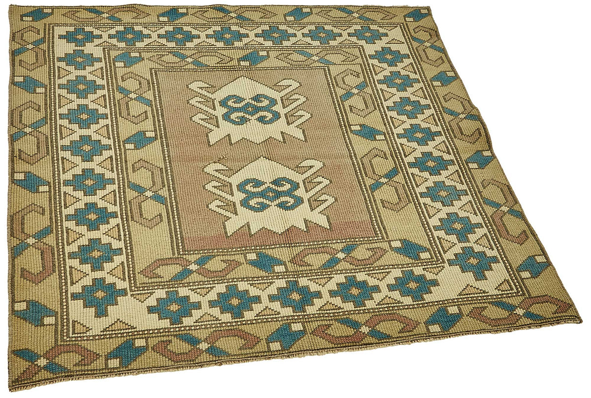 Gekro Bej Mavi Bordürlü Geometrik El Dokuma Halı 105x110 cm – genel görünüm