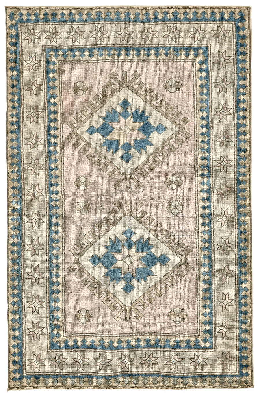 Gekro Toz Pembe Geometrik Desenli Yün ve Pamuk Halı 105x164 cm