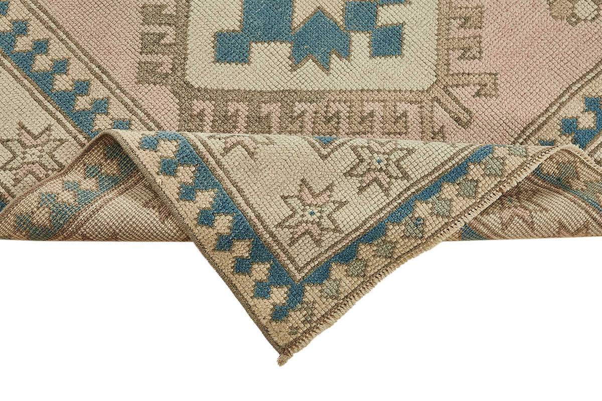Gekro Toz Pembe Geometrik Desenli Yün ve Pamuk Halı 105x164 cm – kenar detayı
