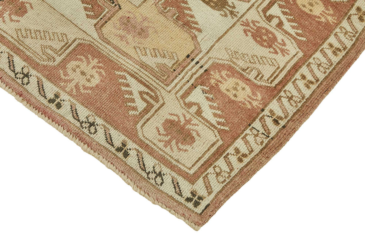 Gekro Bej Zeminli Kırmızı Geometrik Desenli Yün Halı 126x194 cm – detay görünümü