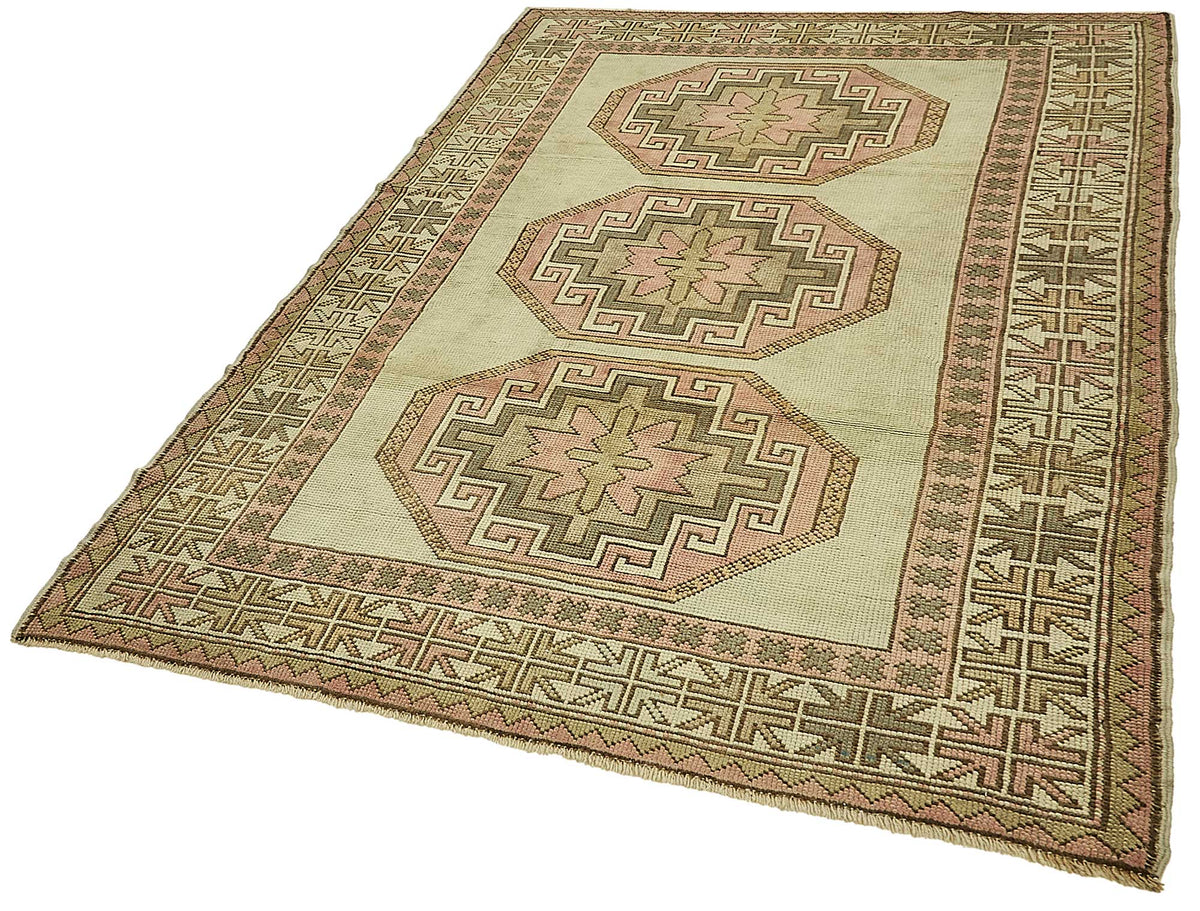 Gekro Vintage Bej Madalyon Desenli Yün Halı 150x215 cm – doku yakın çekim