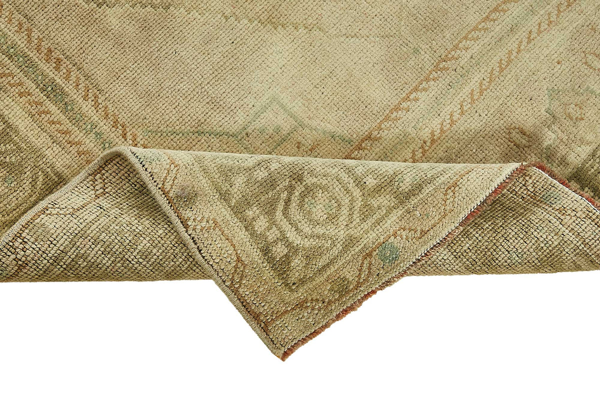 Gekro Madalyon Desenli Bej Kahverengi El Dokuma Halı 106x210 cm – kenar detayı