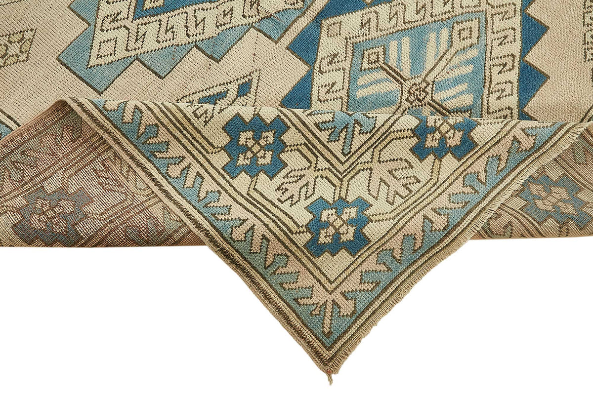 Kavale Madalyon Desenli Bej Mavi Vintage El Dokuma Halı 174x220 cm – kenar detayı