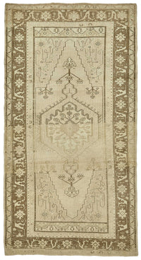 Kavale Geometrik Desenli Bej Rengi El Dokuma Halı 140x257 cm