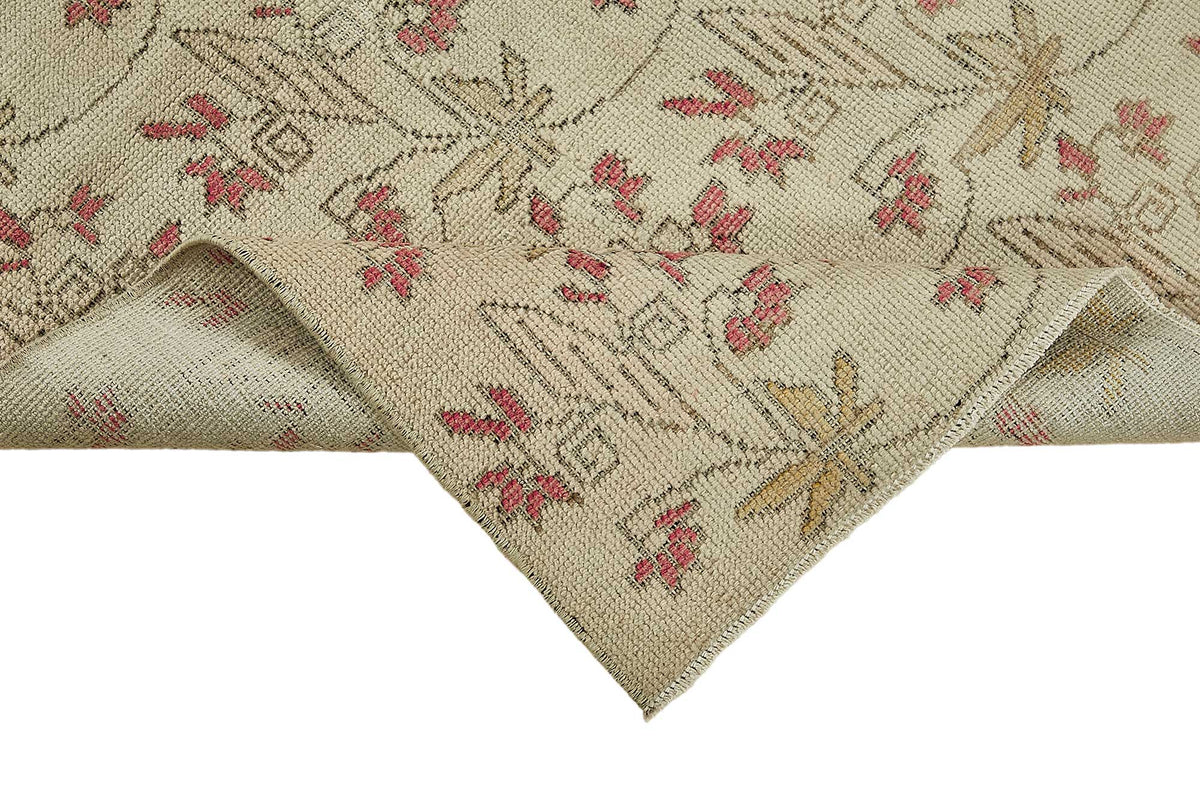 Gekro Vintage Anadolu Halısı Bej ve Pembe Çiçek Desenli 116x209 cm 49933 – kenar detayı