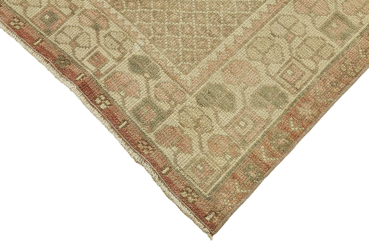 Gekro Bej ve Pembe Etnik Geometrik Desenli Yün Halı 121x250 cm – detay görünümü