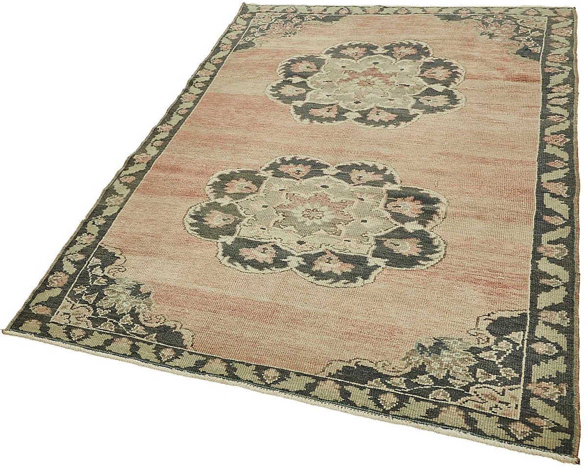 Gekro Pembe Madalyon Desenli Yün Pamuk El Dokuma Halı 139x205 cm – doku yakın çekim