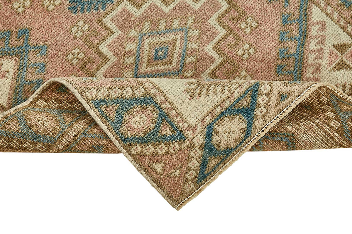 Gekro Pembe Mavi Etnik Geometrik Desenli El Dokuma Halı 65x110 cm – kenar detayı