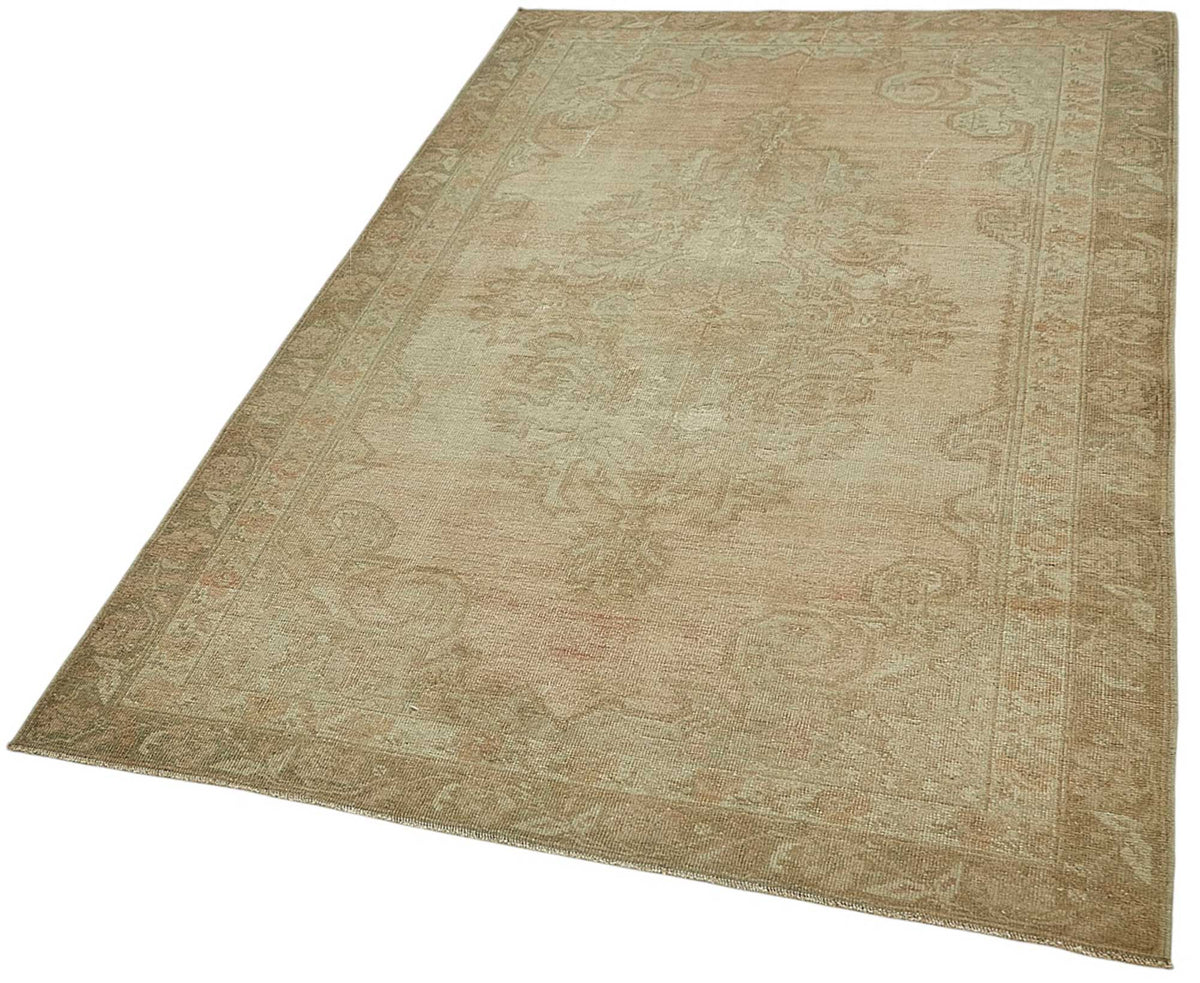 Gekro Bej Kahverengi Madalyon Desenli Yün El Dokuma Halı 119x197 cm – doku yakın çekim