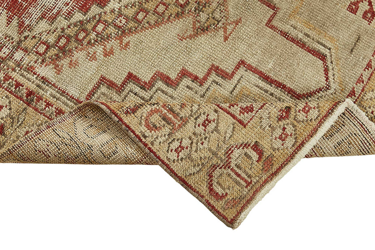 Gekro Geometrik Desenli Bej ve Kırmızı Etnik Halı 91x182 cm – kenar detayı