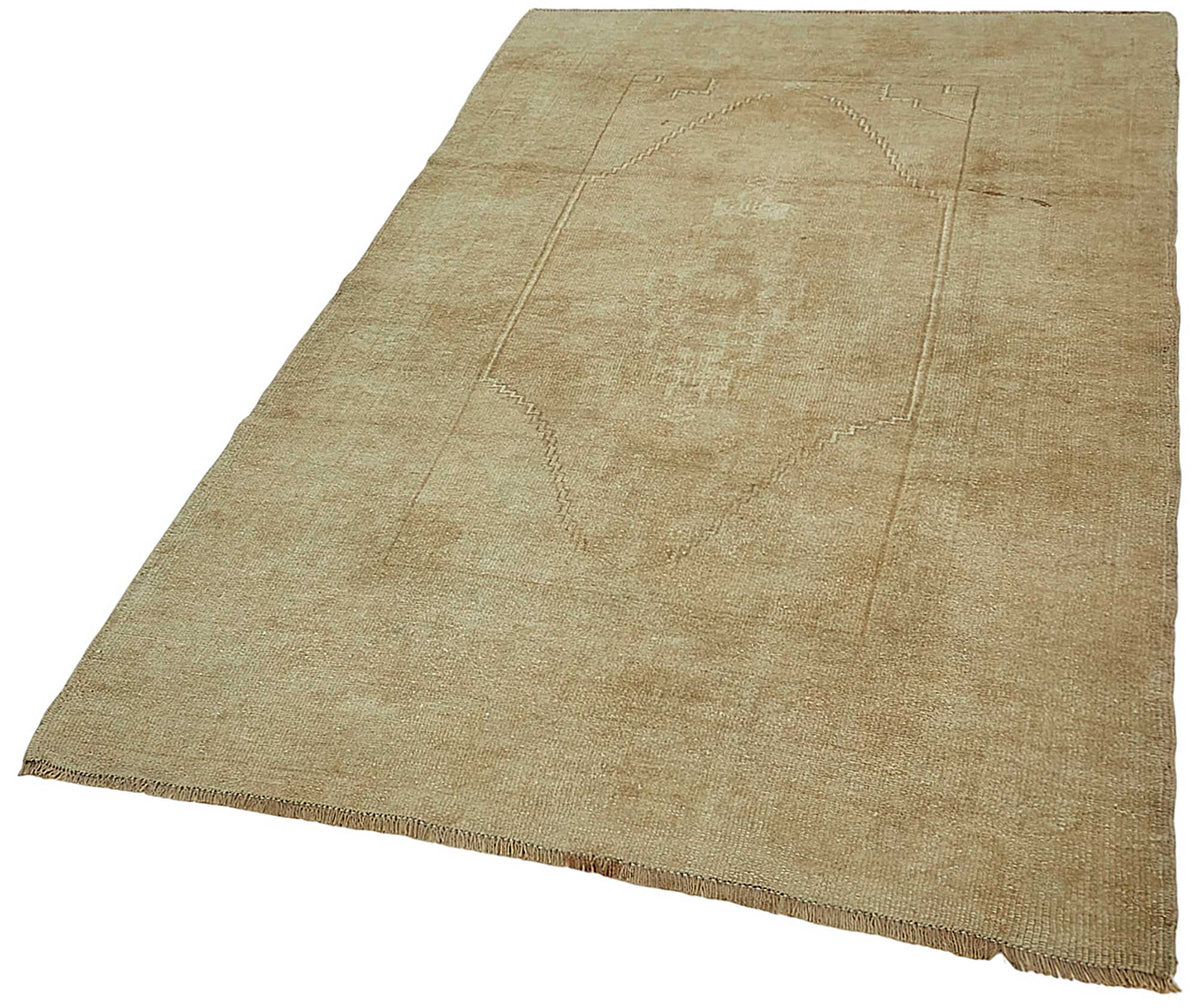 Gekro Bej Etnik Madalyon Desenli El Dokuma Halı 126x217 cm – doku yakın çekim