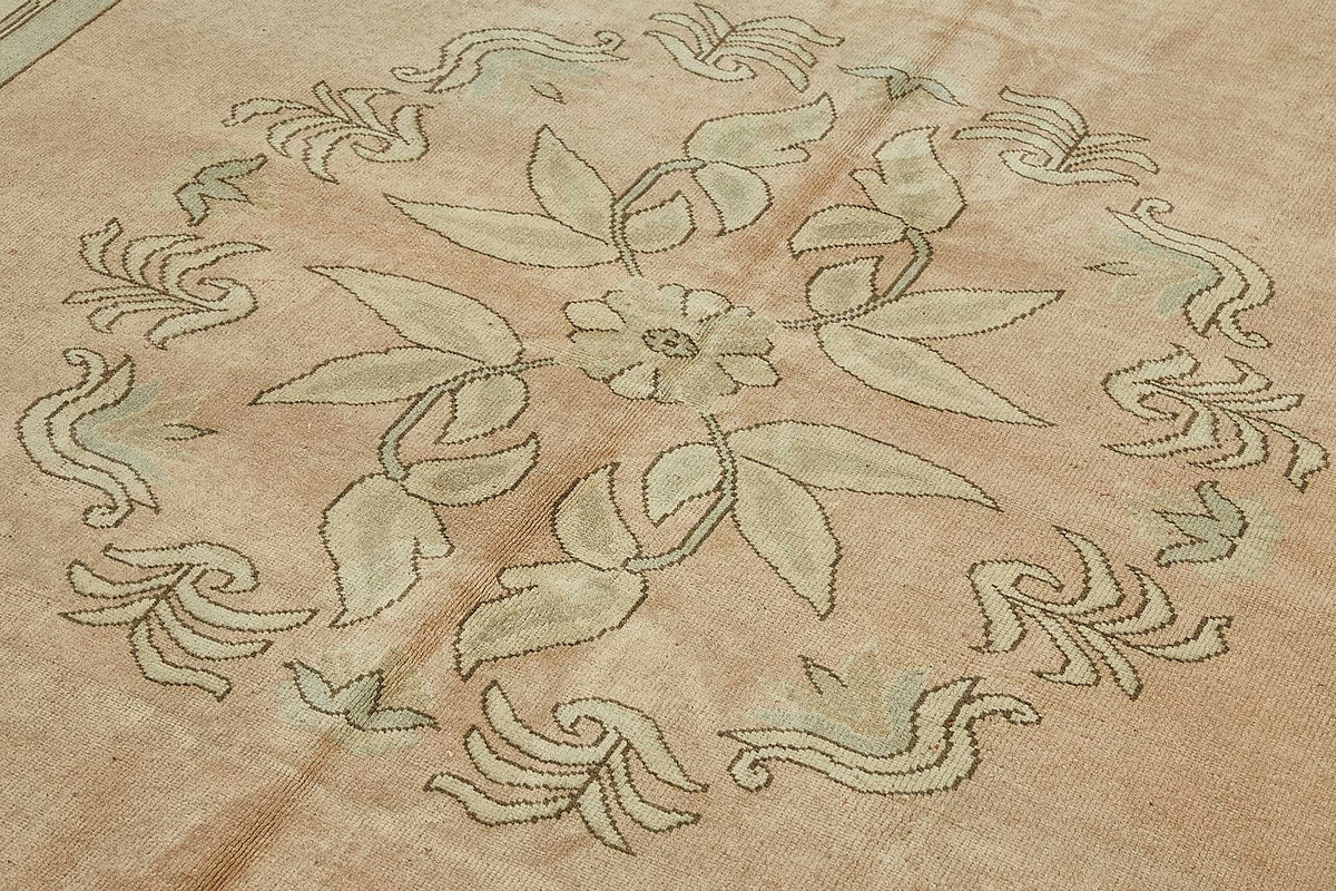 Kavale Madalyon Desenli Pembe Bej Vintage El Dokuma Halı 218x320 cm – mekânda kullanım
