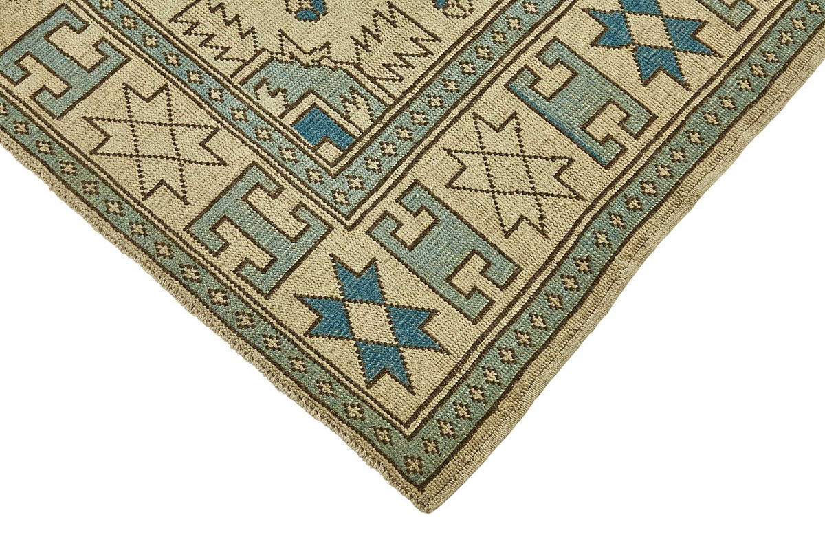Kavale Bej ve Mavi Madalyon Desenli Yün Vintage Halı 172x235 cm – detay görünümü