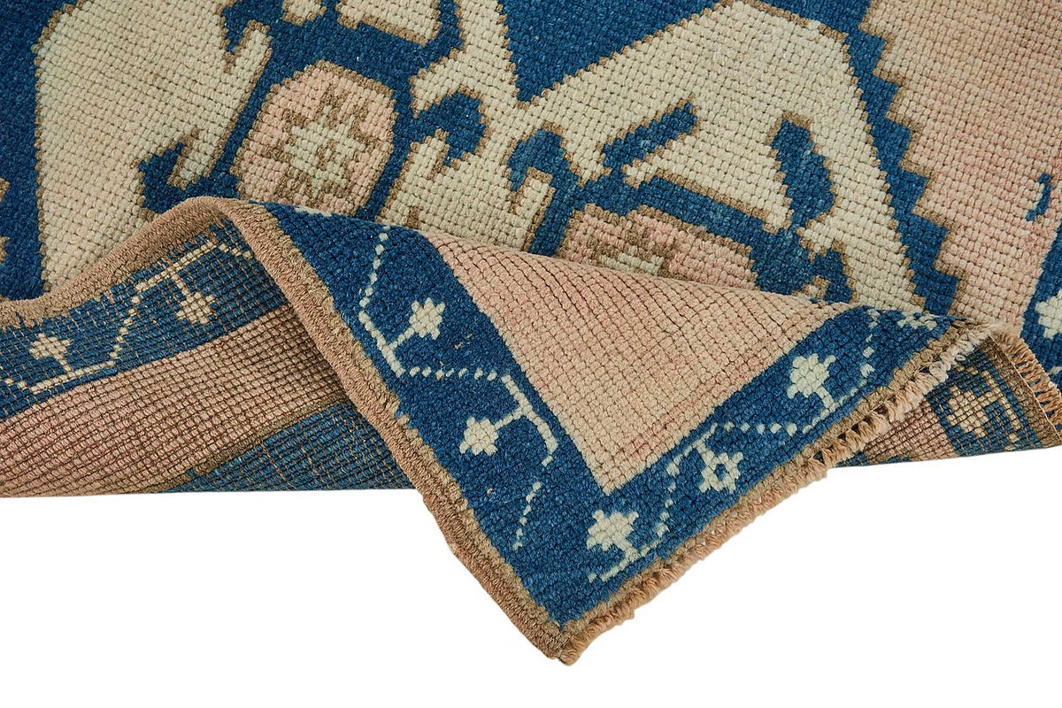 Vayla Pembe Lacivert Madalyon Desenli El Dokuma Halı 64x68 cm – kenar detayı